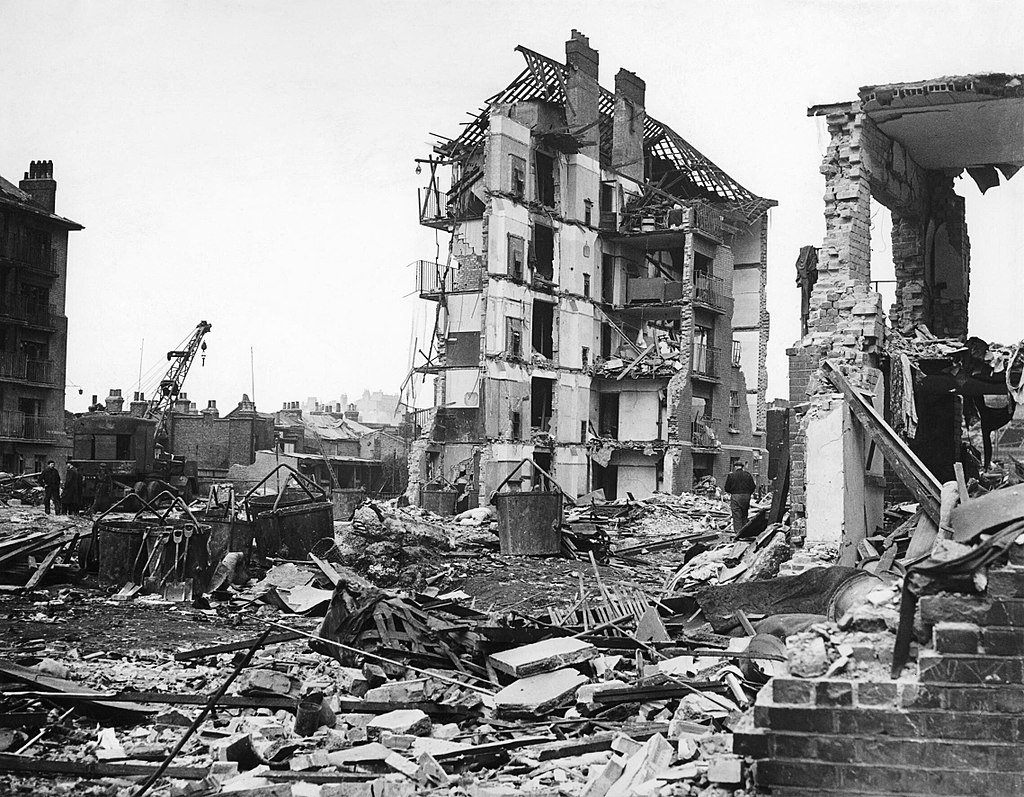 1024px-Damage_Caused_by_V2_Rocket_Attacks_in_Britain,_1945_HU88803